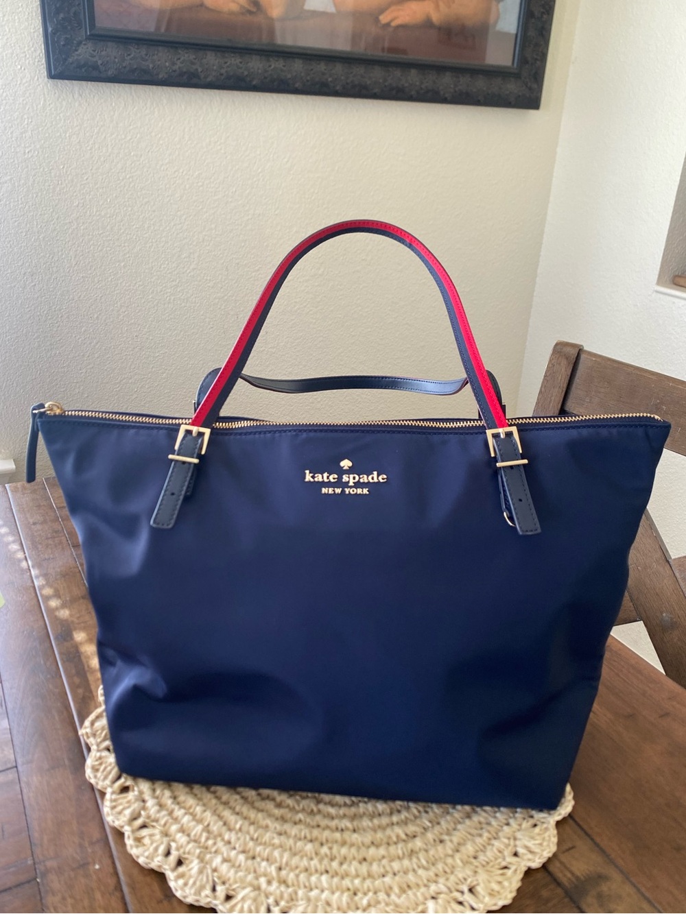 kate spade navy tote with red-trim handles